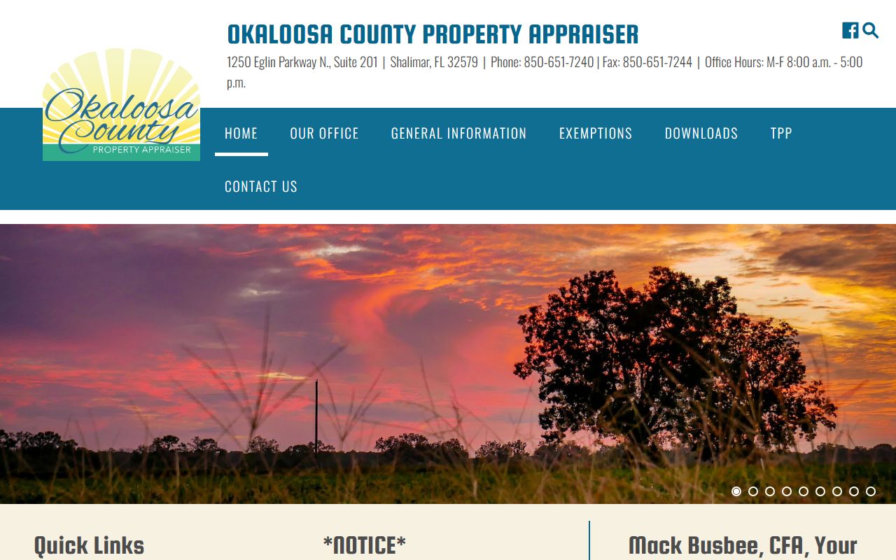 Okaloosa County Property Appraiser website showing property search tools and menu